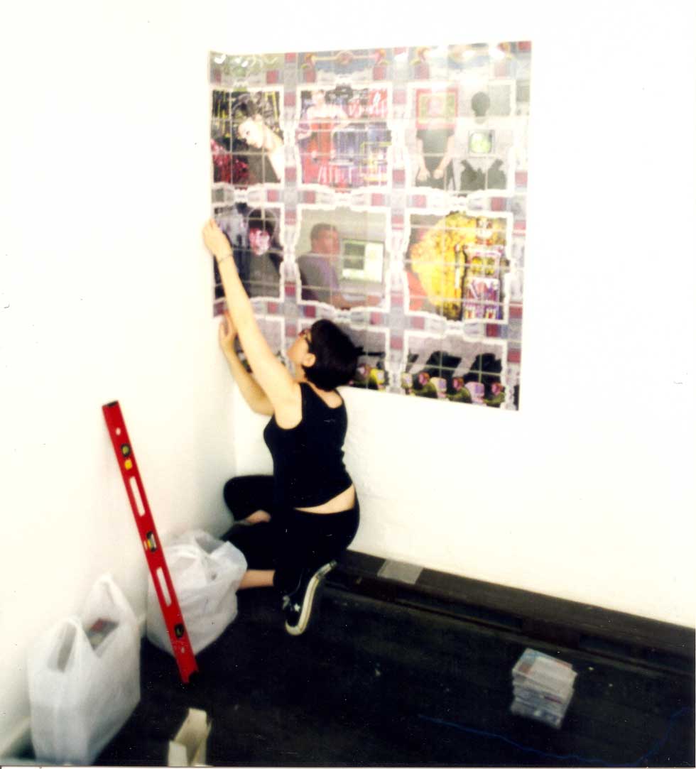 Artist, Rosz Craig,  installing many pieced artwork for exhbition called Many Makepeaces for Moneypenny in 1999. Joint show with Neil Degney at Soapbox Gallery Brisbane Australia.